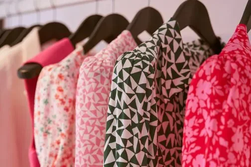 Hobbs woman's outfits selection hung up on a clothing rail.